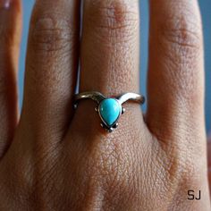 "This fine sterling silver ring features natural turquoise. Adjustable ring band allows you to wear it on any finger or stack with others. 100% Solid 925 sterling silver Authentic turquoise from Arizona, US Handcrafted Size: adjustable band, fits all sizes * By Sowell Jewelry. Stamped with \"925\" and \"SJ\" Official site: www.sowelljewelry.com SUBSTANTIAL PACKAGING: To ensure our packaging is as eco-friendly as possible, we only use recyclable materials such as paper and cardboard." Silver Stackable Turquoise Ring For Anniversary, Turquoise Gemstone Stackable Promise Rings, Silver Stackable Turquoise Ring With Open Shape, Silver Stackable Open Turquoise Ring, Stackable Silver Open Turquoise Ring, Stackable Open Silver Turquoise Ring, Sterling Silver Turquoise Ring As Birthstone, Open Turquoise Ring For Promise, Unique Stackable Turquoise Ring For Anniversary