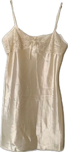 Feminine Cream Nightgown With Lace Trim, Elegant Fitted Cream Sleepwear, Elegant Cream Sleeveless Nightgown, Elegant Sleeveless Cream Nightgown, Elegant Beige Nightgown, Elegant Beige Nightgown For Sleep, Elegant Beige Sleepwear For Wedding Night, Cream Sleepwear With Delicate Lace, Delicate Lace Sleepwear In Cream