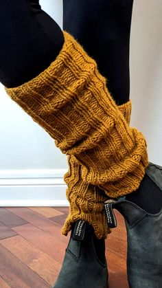 Hand knitted adult sized leg warmers. Ribbed knit in mustard colour, which is great for Autumn! These leg warmers are stretchy with a slight flare, allowing them to be worn both inside and outside a boot. Materials comprised of 80% acrylic and 20% wool, making them soft and warm. Fitted Knitted Leg Warmers For Fall, Fitted Knitted Socks For Fall, Knitted Leg Warmers For Fall, Knit Fitted Socks For Fall, Fitted Knit Socks For Fall, Casual Fitted Knitted Leg Warmers, Casual Thick Knitted Leg Warmers, Knitted Stretch Leg Warmers For Cold Weather, Knit Knitted Leg Warmers For Cold Weather