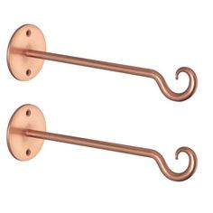 two copper metal hooks on a white background