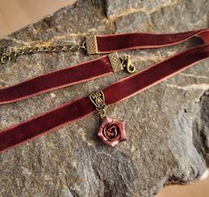 "Velvet ribbon choker with sculpted flower. Material of rose is polymer clay. Each petal of flower made by hand Dia flower about 15 mm/ 0.55 \" Length of necklace is adjustable: 10-12 inches/ 25,4 - 30,5 cm 11-13 inches/ 28-33 cm 12-14 inches/ 30.5- 35.5 cm 13-15 inches/ 33-38 cm 14-16 inches/ 35.5 cm-40.5 cm 15-17 inches/ 38,1 cm- 43,2 cm 16-18 inches/ 40.6 cm- 45.7 cm 17-19 inches/ 43 cm - 48 cm 18-20 inches/ 45,5- 50.8 cm Width of ribbon 10 mm / 0.4 inch Polymer clay isn't afraid of water, st Adjustable Rose Necklace Perfect For Gifting, Rose Design Choker Jewelry For Gift, Handmade Flower Choker For Gift, Adjustable Rose Necklace For Gift, Handmade Adjustable Choker For Valentine's Day, Adjustable Wedding Choker For Valentine's Day, Adjustable Ribbon Jewelry Gift, Adjustable Ribbon Necklace For Gifts, Adjustable Ribbon Jewelry For Gifts