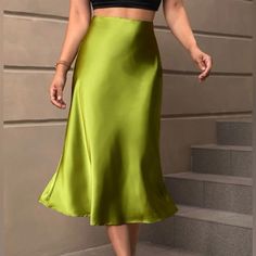 Must Have To Wear Year Round. This Satin Midi Skirt Is A Luxury Essential- Cut On The Bias To Flatter Your Curves. Pair It With A Sweaters For Comfort + Style Or Dress It Up With A Jacket. Green Satin Skirt, Elegant Midi Skirt, Party Mode, Bias Cut Skirt, Trumpet Skirt, Fishtail Dress, Satin Midi Skirt, Spring Skirts, Women Halter