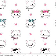 a pink background with white cats and crowns on it's heads, all in different sizes