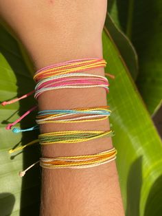 Our cute bracelets are perfect for a beach day in the sun. You can wear them together or separately!  These bracelet are waterproof and adjustable 6 to 8 inches.  Handmade in San Diego 🌴 Follow us! Instagram: @SeaLaVieShops Surf Bracelets, Surfer Girl, Cute Bracelets, Pink And Yellow, Blue Bracelet, Charm Bracelets, Beach Day, Favorite Jewelry, San Diego