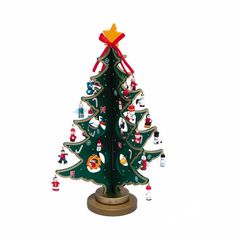 a wooden christmas tree with ornaments on it