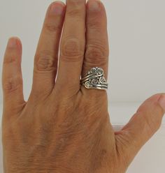 R1367- Sterling Silver Swirl, Scroll Ocean Wave Ring. Size 8 1/2. I can size it to fit, just contact me. No charge to size down. Handmade One of a Kind Artisan Ring Made in the USA with Free Domestic Shipping! The top of the ring measures 17 mm and the band is 2 mm. This ring is made by the Lost wax Casting method, were I make the design in wax and then cast it into silver. To learn more about Me and the Lost Wax Method please visit my website at www.denimanddiamondjewelry.com Thanks for visitin Unique Spiral Rings For Anniversary, Handmade Spiral Rings For Anniversary, Handmade Spiral Anniversary Rings, Handmade Unique Swirl Rings, Unique Swirl Rings For Anniversary, Resize Ring, Artisan Rings, Wave Ring, Wax Casting