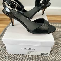 New Calvin Klein Black Laila Open Toe Sandal With Ankle Strap And 2.5 In Heel. Never Worn. Calvin Klein Sandals With Ankle Strap And Heel Strap, Calvin Klein Ankle Strap Sandals With Heel Loop, Black Ankle-high Sandals With Padded Heel, Calvin Klein Black Sandals For Summer, Ankle-high Sandals With 4-inch Heel And Medium Width, Medium Width Ankle-high Sandals With 4-inch Heel, Fitted Open Toe Calvin Klein Heels, Calvin Klein Open Toe Heels With 4-inch Heel, Ankle Strap Heels With Branded Insole, Medium Width