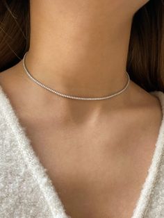 Minimalistic sterling silver choker with zirconia stones.  This choker is perfect to wear as everyday or special day jewelry.  Lightweight and minimalist. MEASUREMENT : Сhoker length is adjustable: 35-40 cm / 13,7-15,7 inches  All jewelry comes in a pretty gift box, ready to be given as a gift. Dainty Silver Tennis Necklace, Chocker Neckless, Minimalist Necklace Silver, Choker Necklace Silver, Sterling Silver Choker Necklace, Baguette Necklace, Diamond Choker Necklace, Sterling Silver Choker, Dainty Choker