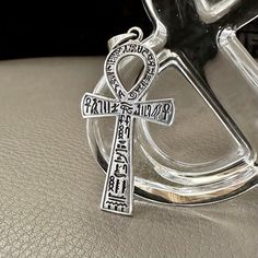 Handcrafted Solid Sterling Silver .925/ Ankh Cross Pendant 100% hand-polished solid sterling silver Ankh pendant properly crafted in solid 925 sterling silver with a 925 stamp on the backside. Ankh referred to as the key of life or the key of the nile--is representative of eternal life in Ancient Egypt. The ankh may also represent water, air, and the sun, which were meant to provide and preserve life in Ancient Egyptian culture. Width 2.7cm, Height 4.8cm, Weight 6.6grams All products here are GUARANTEED 925 Sterling Silver of finest standard. We offer a 30 day money back in our shop policies if you are not happy with the purchase. Customer experience is my first priority. I want you to feel happy with your purchase and love the item you choose. Every feedback were used to its full potentia Symbolic Antique Silver Necklace Stamped 925, Handmade Silver Necklace With Cross Pendant, Handmade Silver Cross Pendant Necklace, Silver Necklace With Large Symbolic Pendant, Symbolic Silver Necklace With Large Pendant, Silver Symbolic Necklace With Large Pendant, Symbolic Pendant Necklaces Stamped 925, Symbolic Pendant Necklace Stamped 925, Symbolic 925 Stamped Pendant Necklace