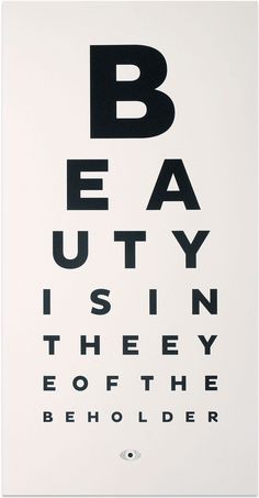 an eye chart poster with the words beauty in black and white, on a white background