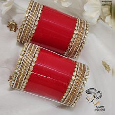 Nusrat bridal chooda With touch of glittery bangles and kundan work Sizes in inches For any assistance, contact us on whatsapp Color is Red Kundan Bracelets With Zari Work For Wedding, Red Meenakari Kundan Bangle, Red Kundan Bangle For Wedding, Red Zari Work Bangle For Wedding, Red Cutdana Bangle For Wedding, Red Kundan Bangle In Bollywood Style, Red Kundan Bangle With Zari Work, Red Zari Work Bracelet For Wedding, Red Bollywood Bangle With Stone Work