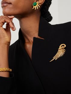 Sonia Petroff's jewelry is inspired by the founder's original handmade, mid-century designs. Cast from gold-plated metal, this brooch is shaped to resemble a swan and set with scores of tonal Swarovski crystals that sparkle from every angle. Pin it to the lapel of your blazer. Chic Gold Brooch For Evening, Gold Wedding Brooches In Chic Style, Classic Evening Brooch, Chic Gold Wedding Brooch, Gold Wedding Brooches Chic Style, Chic Gold Wedding Brooches, Gold Chic Wedding Brooches, Luxury Gold Brooch Lapel Pin, Luxury Yellow Gold Lapel Pin Brooch