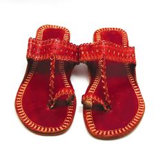 Check out our brand-new, genuine handcrafted Kolhapuri sliding sandals from India, high-quality leather sandals with an ethnic Indian toe strap that are incredibly comfortable and simple to use. The leather is prepared in such a way that it has no allergenic characteristics at all and feels light, smooth, and silky. Hand stitching and punching are being used. These unisex slippers are ideal for everyday use as well as for any formal event. We offer various different shoe styles. For more of our selection, visit our page! We send packages to you promptly and well packaged for a safe journey. We appreciate your support of our little business. Shipped from the USA. Traditional Red Open Toe Sandals, Traditional Adjustable Slip-on Sandals, Traditional Slip-on Sandals For Festivals, Handmade Traditional Red Sandals, Leather Chappals, Kohlapuri Chappal Women, Gold Wedge Heels, Indian Sandals, Simple Sandals