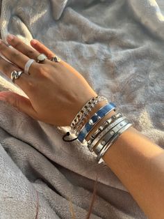 @Iwannag0t0plut0 Silver Rings Stacking, Good And Silver Jewelry Together, Silver Jewelry Girl, Silver Bangle Stack, Silver Jewelry Stack Bracelets, Chunky Silver Bracelets, Silver Stacked Bracelets, Silver Bracelet Stack Aesthetic, Silver Bangles Aesthetic