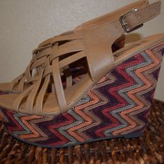 Brand New, Retro Look Zig Zag Fabric Wedges. All Man Made Material. Staps Buckle And Are Adjustable. No Imperfections, But They Are A Little Dusty From Sitting In The Box. Fit Seems True To Size. Questions? Please Let Me Know! Brown High Heel Wedge Sandals For Beach Season, Brown Wedge Sandals For Beach Season, Brown Summer Wedge Sandals In Synthetic, Brown Synthetic Summer Wedge Sandals, Brown Synthetic Summer Heels, Synthetic T-strap Wedge Sandals For Spring, Brown T-strap Wedge Sandals For Summer, Spring T-strap Synthetic Wedge Sandals, Nice Sandals