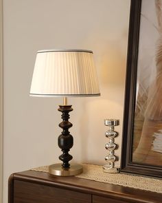 The intricately carved wooden base is reminiscent of historic lighthouse structures, while the pleated shade adds a soft, diffused glow. This lamp effortlessly combines timeless craftsmanship with a modern aesthetic, making it ideal for those looking to create a warm, inviting ambiance in any room. Light Source One 40 watt maximum medium (E26 or E27) bulb required. (Not included bulbs) Dimmable with compatible dimming bulbs. Measurements Model A: D13 x H22.4" Model B: D13 x H25.2" Plug Cord On/O Crystal Chandelier Kitchen, Hallway Wall Lights, Tiffany Style Table Lamps, Chandelier Art, Victorian Interiors, Kitchen Island Chandelier, Recessed Wall Lights, Flushmount Ceiling Lights, Entry Hallway