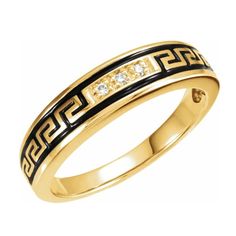 an 18k yellow gold ring with black and white enamel inlays, set with diamonds