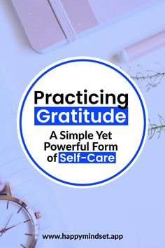 a blue circle with the words practicing gratitude on it next to a pen and flower