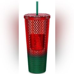 a red and green cup with a straw in it