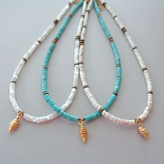 "* Seashell Beaded Necklace * * Choose from Mother of Pearl, Turquoise, or Howlite * * Fits 15\"-18\" Neck - if you need a different length, leave me a message * Details: * 2x4mm Heishi beads * Gold Seashell Charm * Gold Hematite Spacers * Gold Stainless Steel Chain & Clasp ★ Turquoise serves as a bridge between the spiritual and the physical aiding communication between the realms. It's the stone of honest, truthful communication. It provides strength, protection, and purifies energy. ★ Pearls Seashell Bead Necklace, Necklaces Summer, Summer Beach Jewelry, Seashell Necklace, Summer Necklace, Turquoise Howlite, Heishi Beads, A Bridge, Beaded Necklaces