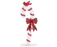 a candy cane with a bird on top and red ribbon around the neck is shown