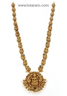 22 karat gold "lakshmi - peacock" long necklace with cz, color stones & culture pearls (temple jewellery)
   - 235-GN5521 - in 56.150 Grams for USD $5,625.58 USD. 
Made in India by Totaram Jewelers Online this product is in Gold - 22 Karat BIS Hallmark 916 Gold  & is an excellent gift for Adult - Women. Ships fully insured with secured guaranteed delivery for free with your order over $250 from New Jersey USA & comes with 30 days exchange policy. Luxury Yellow Gold Temple Necklace In Chandbali Style, Luxury Temple Necklace In Yellow Gold With 17 Jewels, Luxury Heavy Temple Necklace For Puja, Luxury Temple Jewelry Beaded Pendant Necklaces, Luxury Traditional Temple Necklace With Gemstones, Luxury Long Temple Jewelry Necklace, Luxury Brass Temple Necklace For Ceremonial Occasions, Elegant Luxury Yellow Temple Necklace, Luxury Yellow Gold Temple Necklace For Puja