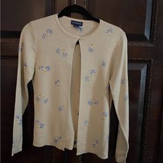 Vintage Ann Taylor 100% Silk Cardigan Size M. The Flowers Are Embroidered. It’s A Gorgeous Cardigan In Near Pristine Condition. Elegant Embroidered Spring Sweater, Elegant Embroidered Spring Cardigan, Elegant Crew Neck Cardigan For Spring, Fitted Sweater With Floral Embroidery For Spring, Fitted Long Sleeve Cardigan With Floral Embroidery, Elegant Crew Neck Spring Outerwear, Fitted Crew Neck Embroidered Cardigan, Fitted Embroidered Crew Neck Cardigan, Spring Embroidered Crew Neck Outerwear