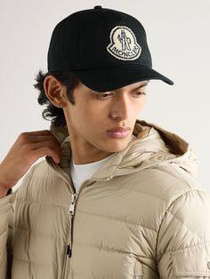 Moncler's logo is easily recognisable, even when it's pixellated. This baseball cap is made from cotton-twill and appliquéd with a blurred patch bearing its emblem. Cotton Baseball Cap With Logo Detail, Luxury Baseball Cap With Logo Patch, Designer Snapback Baseball Cap With Embroidered Logo, Cotton Snapback Baseball Cap With Logo, Luxury Embroidered Logo Snapback Baseball Cap, Luxury Snapback Baseball Cap With Embroidered Logo, Luxury Embroidered Snapback Baseball Cap, Luxury Hats With Logo Patch And Curved Brim, Luxury Black Baseball Cap With Curved Bill