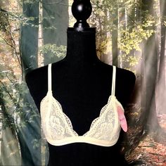 Pale Yellow Bralette Size M/L Sexy Lacy Design Brand New With Tags Lace Triangle Bralette. Floral Sheer Lace Triangle Low-Cut Unpadded Mesh Lined Bralette, Adjustable Straps, And Back Hook Closure. 95% Nylon 5% Spandex Sheer Lace Summer Bra, Spring Party Bra With Delicate Lace, Spring Sheer Fitted Bra, Sheer Bra For Party In Spring, Sheer Party Bra For Spring, Spring Delicate Lace Fitted Bra, Sheer Low-cut Summer Bra, Fitted Triangle Top Bra With Delicate Lace, Delicate Lace Stretch Bra For Summer