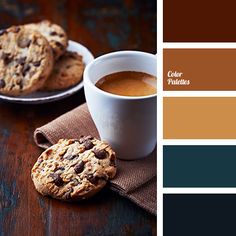 a cup of coffee and some cookies on a table with color swatches in the background