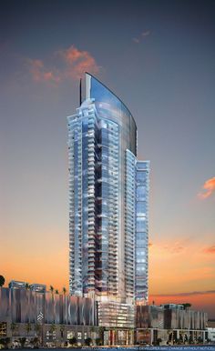 an artist's rendering of a skyscraper at dusk