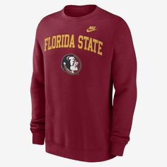 The Legacy Classic Arch Over Logo Crew brings a classic Florida State Seminoles look to fans’ wardrobes. It features a soft brushed French terry lining for warmth and throwback team details for a vintage aesthetic. Nike Cotton Sweater For Fall, Collegiate Nike Sweatshirt For College, Nike Tops For College In Fall, Winter College Nike Tops, Nike Collegiate Tops For Fall, Nike Collegiate Sweatshirt For Winter, Nike Collegiate Long Sleeve Sweatshirt, Nike Collegiate Sweatshirt, Crew Team