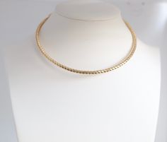 This elegant Gold Torque Choker Necklace adds a touch of sophistication to any outfit. It is durable and comfortable to wear. Its unique design and sleek finish make it a versatile piece that can be dressed up or down for any occasion. Elevate your style with this beautiful necklace. Beautiful Necklace, Tennis Bracelet, Elevate Your Style, Christmas Sale, Beautiful Necklaces, Your Style, Make It, Choker, Unique Design