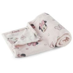 a minnie mouse blanket laying on top of a white surface