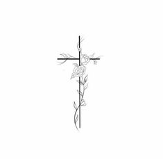 a cross with roses on it and the word love is written in black ink over white paper