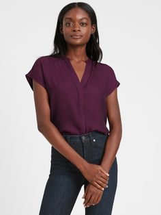 Dolman sleeves and a relaxed cut give this easy-wearing popover top an effortlessly pulled-together vibe.  Banded collar.  Short, dolman sleeves.  Concealed button front placket.  Shirttail hem.  Relaxed fit - no waist definition.  Short, dolman sleeves.  Long body length hits below the hip.  Body length (size S): Petite 25", Regular 26", Tall 28" Model: Size XS, 5'10" (178cm). Casual V-neck Blouse With Rolled Sleeves, Fall V-neck Top With Placket, Chic Short Sleeve Top For Casual Gatherings, Fall V-neck Blouse With Placket, Trendy Relaxed Fit Blouse With Collared Neckline, Trendy Relaxed Fit Collared Neckline Blouse, Trendy Blouse With Relaxed Fit And Collared Neckline, Trendy Relaxed Fit Collared Blouse, Relaxed Fit Tops With Placket For Fall