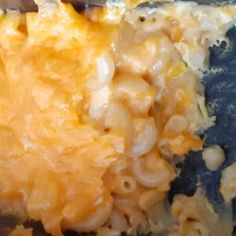 the macaroni and cheese is being prepared to be eaten