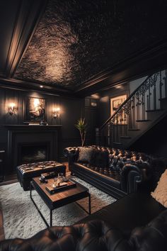 a living room filled with furniture and a fire place under a stair case next to a staircase