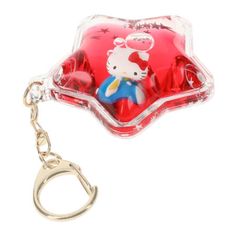 the hello kitty key chain is attached to a plastic case