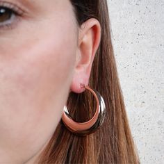 For a simple pair of earrings that always look fabulous, choose these light weight hoop earrings. With a hollow middle, made from stainless steel and finished with 14kt rose gold plating, these earrings are incredibly versatile. We love the shiny, sweet rose gold, and the lightweight feel for all day comfort. Shop these versatile earrings for yourself or for someone special to make a fabulous gift! Clean with a jewellery polishing cloth. Store in a safe place separately to avoid scratching. Modern Rose Gold Hoop Earrings For Everyday Wear, Modern Small Hoop Rose Gold Earrings, Minimalist Rose Gold Hoop Earrings With Polished Finish, Minimalist Rose Gold Tarnish-resistant Hoop Earrings, Modern Rose Gold Small Hoop Earrings, Everyday Shiny Rose Gold Jewelry, Rose Gold Sterling Silver Hoop Earrings With Polished Finish, Rose Gold Polished Sterling Silver Hoop Earrings, Everyday Rose Gold Tarnish Resistant Hoop Earrings