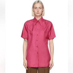 Short Sleeve Silk Twill Shirt In Pink. Spread Collar. Button Closure At Front. Rolled Cuffs. Shirttail Hem. Logo Engraved Gold-Tone Hardware. Comes Wrapped In Gucci Tissue, With Extra Button/Tags. Nwt. Size 40 (Fits A Women S-M). Make An Offer! Gucci Collared Blouse For Spring, Gucci Spring Collared Blouse, Elegant Gucci Button-up Blouse, Gucci Button-up Blouse For Formal Occasions, Gucci Collared Blouse For Formal Occasions, Gucci Button-up Shirt For Spring, Chic Gucci Collared Blouse, Gucci Formal Button-up Blouse, Gucci Formal Collared Blouse