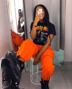 Orange And Black Aesthetic Outfit, Orange Cargo Pants Outfit Black Women, Black And Orange Outfit Black Women, Orange Outfit Ideas Black Women, Orange And Black Outfit Aesthetic, Orange Fall Outfits Black Women, Orange Birthday Outfits Black Women, Orange Fits Black Women, Orange And Black Outfits For Women