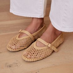 Elevate your look with our natural-tone fishnet Mary Jane ballet flats! They feature a chic buckle closure for timeless style and all day comfort. Shop Now! Espadrilles Ballet Flats, Anthropologie Shoes Flats, French Sandals Shoes, Summer Ballet Flats, Ballet Flats Parisian, French Casual Shoes, Woven Ballet Flats, Mesh Mary Janes Outfit, Mesh Ballet Flats