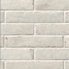 a white brick wall that is very close up