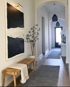 the hallway is clean and ready for us to use as an entrance way in the house