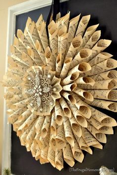 a wreath made out of old book pages