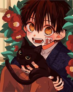 a young boy holding a black cat in his lap with red flowers behind him and an orange background