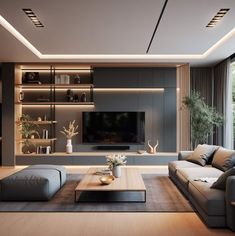 a living room with couches, tables and a television on the wall in it