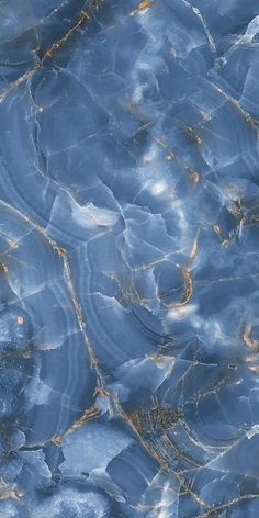 an aerial view of blue and gold marble