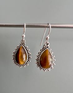 Tigereye sterling silver teardrop earrings. Matching necklace available Gift box available for purchase. Search GIFTBOX Boho Silver Earrings, Tiger Eye Earrings, Brown Earrings, Buy Necklace, Eye Earrings, Lovely Necklace, Delicate Rings, 925 Sterling Silver Earrings, Matching Necklaces